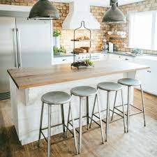 When building a kitchen island using base cabinets, experts recommend permanently fixing the island into the floor for safety reasons. Diy Build Your Own Kitchen Island The May Daily