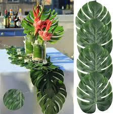 I am also loving the impressive and amazing balloon animal centerpieces decorating each table! Buy Aerwo 14 Artificial Tropical Palm Leaves Safari Birthday Decorations Extra Large Faux Leaf Jungle Hawaiian Party Decorations With Luau Beach Theme Decorations For Table Decoration Accessories 48pcs Online In Kenya B072tv5138