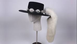 Maybe you would like to learn more about one of these? Stevie Ray Vaughan Hat With Faux Animal Tail Bullock Texas State History Museum