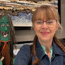 Can anybody in Hot Springs, AR plow a snow-covered driveway for a truck  driver to deliver a load?