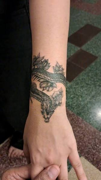 Slippery Dragon wrist band tattoo, #dragon #wristband #female #coverup #tattoo #flowers #theme #death #freehand #instalike #follow #artist