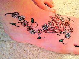 Flowers And Butterfly Tattoo Picture At Checkoutmyink Com Flower Tattoo Foot Butterfly Tattoo Foot Tattoo