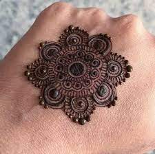 The flower tikka mehndi design for inner hands is all the rage right now. Backhand Amazing Gol Tikki Mehndi Design Mehndi Designs Mehndi Designs For Fingers Basic Mehndi Designs