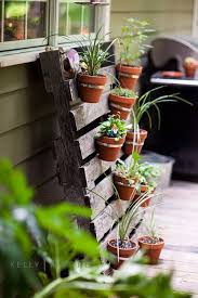 Dishfunctional Designs Creative Ways To Use Pallets Outdoors In Your Garden Vertical Garden Diy Vertical Pallet Garden Vertical Herb Garden