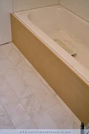 We used a plywood template. Diy Tub Skirt Decorative Panel For A Standard Soaking Tub