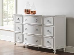This dresser also looks great next to a traditional bed. Universal Furniture White Nine Drawer Triple Dresser Ufu099h040