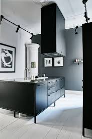 Available in many styles, sizes and wood types. A Black Kitchen Island In Steel With A 4 Mm Table Top In Stanless Steel A Kitchen Solution Raised On Legs Wit Kuche Schwarz Schwarze Kucheninsel Dunkle Kuchen