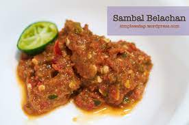 In a small heavy pan, dry roast the shrimp paste until it is aromatic and crumbly. Sambal Belacan Simple Sedap
