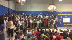 Roscoe Wilson elementary school 5th graders sing school song