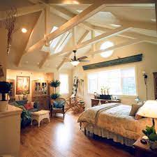Two magnificent chandeliers decorate the ceiling. 20 Bedroom Designs With Vaulted Ceilings