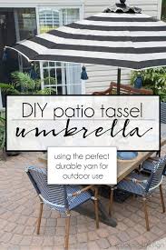 Black And White Striped Outdoor Umbrella Australia Diy Tassel Umbrella Using Durable Outdoor Yarn Cuckoo4design In 2020 Outdoor Decor Backyard Diy Patio Patio Umbrella