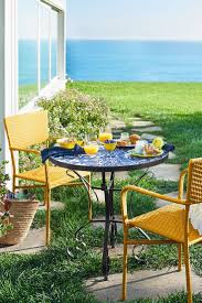 The Global Meets Floral Appeal Of Pier 1 S Chloris Blue Mosaic Bistro Table Is Undeniable And Similar To Bistro Table Outdoor Beach Dining Painted Patio Table