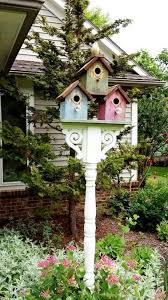 30 Creative Bird House Ideas For Beautiful Yard Rustic Garden Decor Rustic Gardens Vintage Garden Decor