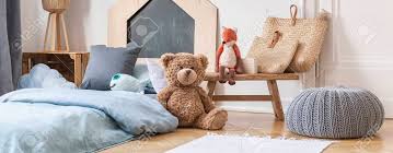 Little Boys Bedroom With Toys Grey Pouf And Bed With Light Blue Stock Photo Picture And Royalty Free Image Image 127522120