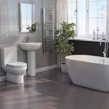 Audrey hall this tiny bathroom by envi interior design studio, via houzz, has more farmhouse than modern, but still meets the definition of a modern farmhouse.the small space is made to look bigger, thanks to a reflective tile in a neutral shade, and a large frameless mirror. Modern Bathroom Suite With Freestanding Bath