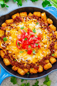 Beef Tater Tot Chos Crispy Tater Tots Topped With Taco Seasoned Ground Beef And Melted Cheese Is A Delici Beef Recipes Mexican Food Recipes Tater Tot Recipes