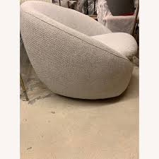 West Elm Cozy Swivel Chair Aptdeco