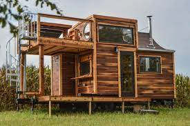 30 Amazing Tiny Houses Exterior Interior Ideas Photos Tiny House Exterior Tiny House Stairs Tiny House Loft