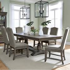 Patterned wallpaper, vibrant shades and a bold glass light fixture add life to this dining room featuring a clean. Samuel Lawrence Lasalle Traditional 7 Piece Trestle Dining Table And Upholstered Chair Set Story Lee Furniture Dining 7 Or More Piece Sets