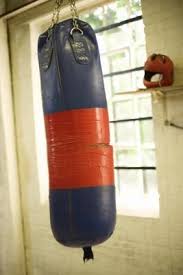 Perfect for beginner boxers and beginner crafters, this heavy bag can be made with old martial arts gear and other materials lying around your home and some masking tape. How To Build A Sliding Heavy Bag Homemade Punching Bag Punching Bag Diy Punching Bag