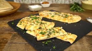 Mini Cheesy Naan Bread Recipe Tastemade Recipes Naan Bread Garlic Naan Bread Recipe