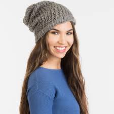 You can make your own knitting loom and make yourself a beautiful poncho even if you don't know how to knit. Loom Knit Slouchy Hat