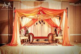 Wonder If I Could Create A Similar Draped Look Over The Fashion Show Stage Using Pink Black Table Muslim Wedding Ceremony Muslim Wedding Asian Wedding Decor