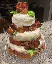 The first layer is of the cake is prime rib, the next layer is rib eye steak, and the top layer is filet. Steak Cake Prime Rib On Bottom Ribeye Filet Mignon Iced With Mashed Potatoes And Bacon Roses For Decorations Pasteles Deliciosos Tartas Recetas De Comida