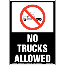 No truck signs alert drivers when trucks are not allowed. No Trucks Allowed Sign With Icon