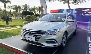 Mg5 ev price & competition. Ø¨ØªØµÙ…ÙŠÙ… Ø¹ØµØ±ÙŠ ÙˆØªÙ‚Ù†ÙŠØ§Øª Ù…ØªÙ‚Ø¯Ù…Ø© Ø§Ù„Ù…Ù†ØµÙˆØ± Ø£ÙˆØªÙˆÙ…ÙˆØªÙŠÙ ÙŠØ·Ù„Ù‚ Ø³ÙŠØ§Ø±Ø© Mg 5 ÙÙŠ Ø§Ù„Ø³ÙˆÙ‚ Ø§Ù„Ù…ØµØ±ÙŠ