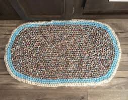 A simple rug can really help amp up the decor in any space. Blue Oval Rag Rug