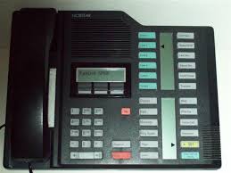A telephone light flashes for incoming calls. Norstar M7324 Telephone Manual Krabc