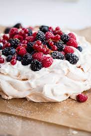 Pavlova, unlike other meringues, is crisp on the outside, but still has chew on the inside. Berry Pavlova With Lemon Whipped Cream A Beautiful Plate