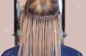 I have been looking for a salon that would give me the personal attention that i wanted. The Hairdresser Does Hair Extensions To A Young Girl A Blonde Stock Photo Picture And Royalty Free Image Image 81052574