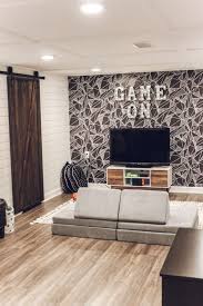 As you can imagine gaming can become even more entertaining when you share it with your friends. Game Room Makeover With Wallpaper Inspired Reality Room Makeover Boys Game Room Game Room Kids