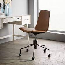 Metal swivel base in an antique bronze finish. Slope Leather Swivel Office Chair
