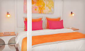 Three Four Five Or Seven Night All Inclusive Stay At Be Live Hamaca Suites In Dominican Republic Bedroom Orange Bedroom Decor Pink Living Room