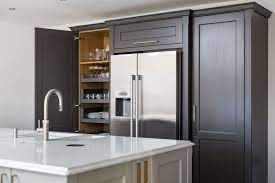 Dezeen awards is the architecture, interiors and design awards programme organised by dezeen, the world's most popular design magazine. A Bespoke Transitional Style Shaker Kitchen In Light And Dark Grey Cabinetry With Pull Out Larder Storage And Kitchen Plans Shaker Kitchen Grey Shaker Kitchen