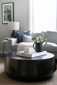 A Black Round Coffee Table For Our Living Room The Diy Playbook Table Decor Living Room Living Room Coffee Table Round Coffee Table Living Room