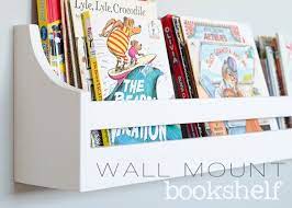 While Updating Our Daughter S Bedroom My Husband And I Wanted To Add Some Storage For Her Many Books We Wall Mounted Bookshelves Bookshelves Wall Bookshelves