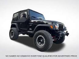 Image result for Brilliant Black 2002 Jeep
