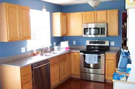 blue kitchen with oak cabinets blue