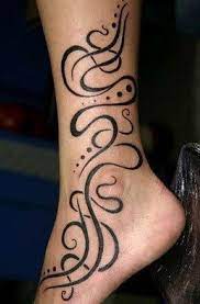 The american flag as a background for a cross is a popular patriotic tattoo design. Tribal Foot Tattoo Ankle Tattoo Designs Tribal Tattoos Tattoos