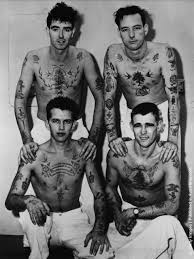 Pam Nash, tattooed men.