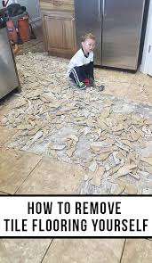 The floor and trim always look clean and neat when they finish. How To Remove Tile Flooring Yourself With Tips And Tricks All Things Thrifty