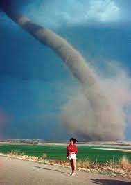 Novinky ze závodů f1 v roce 2020. Girl Poses Next To A F1 Tornado A Mile Away Weather