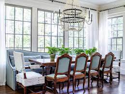 The hanging chandelier tops it all off with its warm lighting. 20 Dining Room Lighting Ideas Dining Room Light Fixtures For Every Style Hgtv