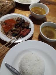 It is a traditional indonesian dish that consists of a scoop of steamed rice, served with a small portion of many sides, such as fish, chicken, vegetables, eggs, and keropok (fried shrimp paste). Nasi Campur Bali Picture Of Babi Guling Chandra Denpasar Tripadvisor