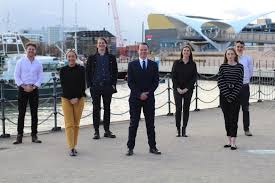 Young professionals networking, socialising and house sharing