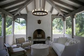 If your patio is already covered with a roof, enclosing it cheaply is simple. Enclosed Patio Transitional Deck Patio